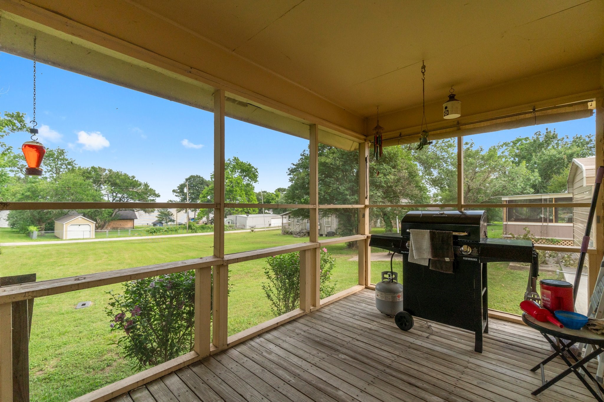 21 Clearview Point Blank, TX 77364 - Photo 26 of 43 a view of a balcony with chairs and wooden floor