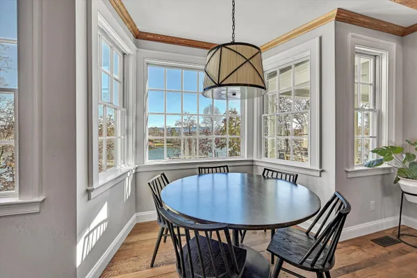 a spacious bathroom with a double vanity sink a mirror and a shower