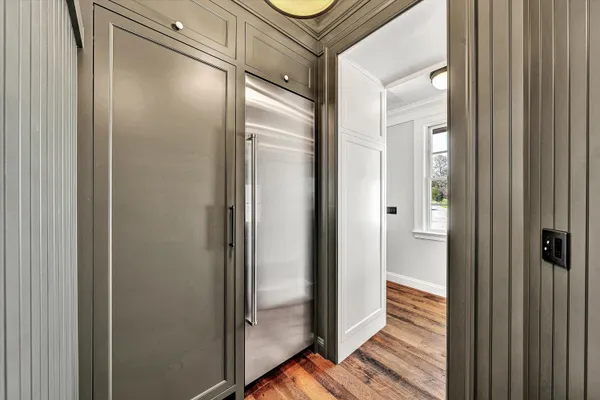a bathroom with a sink a vanity and a mirror