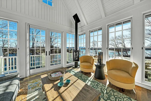 a bathroom with a toilet a sink and a mirror