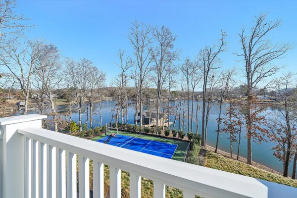 a bathroom with a bathtub and a window