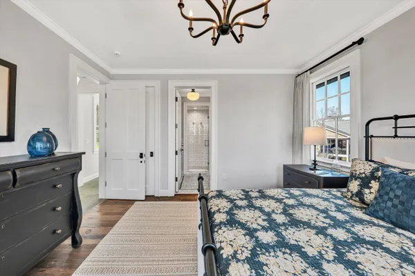 a view of a house with snow on the road