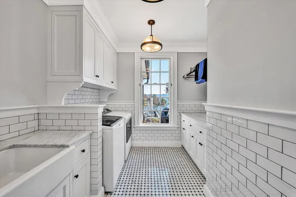 a picture of a room with a white wall and a picture of a white wall