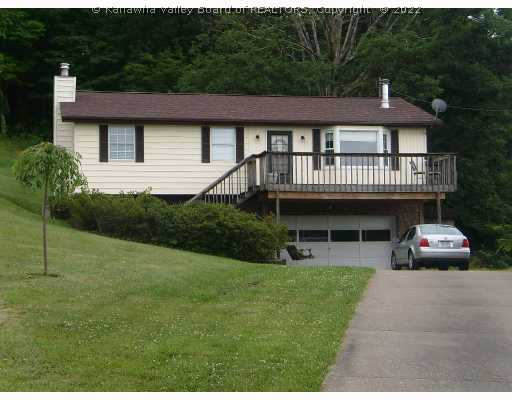 1967 Grapevine Road Charleston, WV 25320 - Photo 1 of 8 Exterior Front. Nice 3 BR/2 BA house! 2-car garage. Upgraded kitchen with stainless appliances. Sunset views from front deck and private deck off dining area in rear! This house on 11 acres is covered with trails and is the perfect getaway for an outdoor enthusiast!