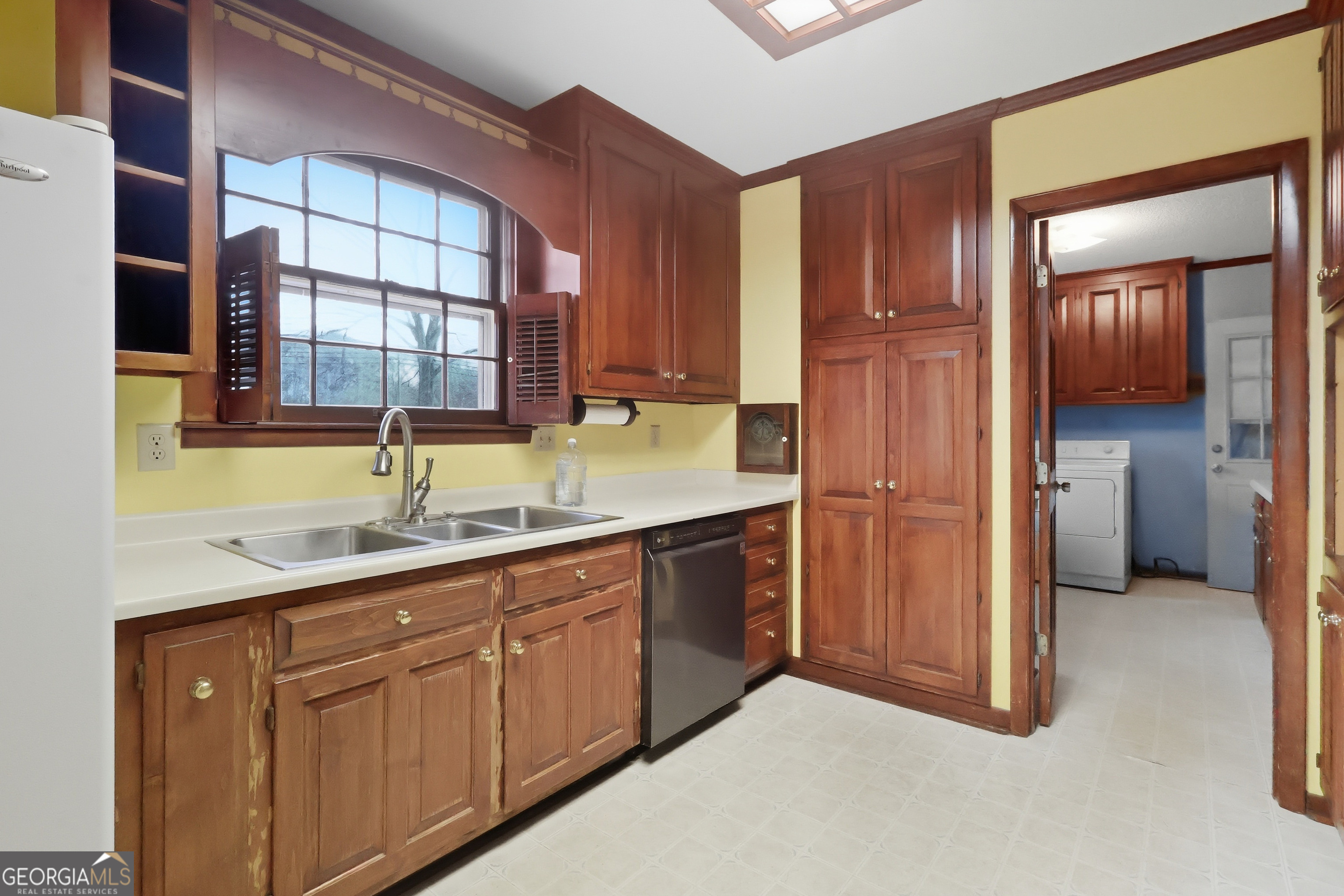 41 Brooks Street Royston, GA 30662 - Photo 12 of 44 a kitchen with a sink and cabinets