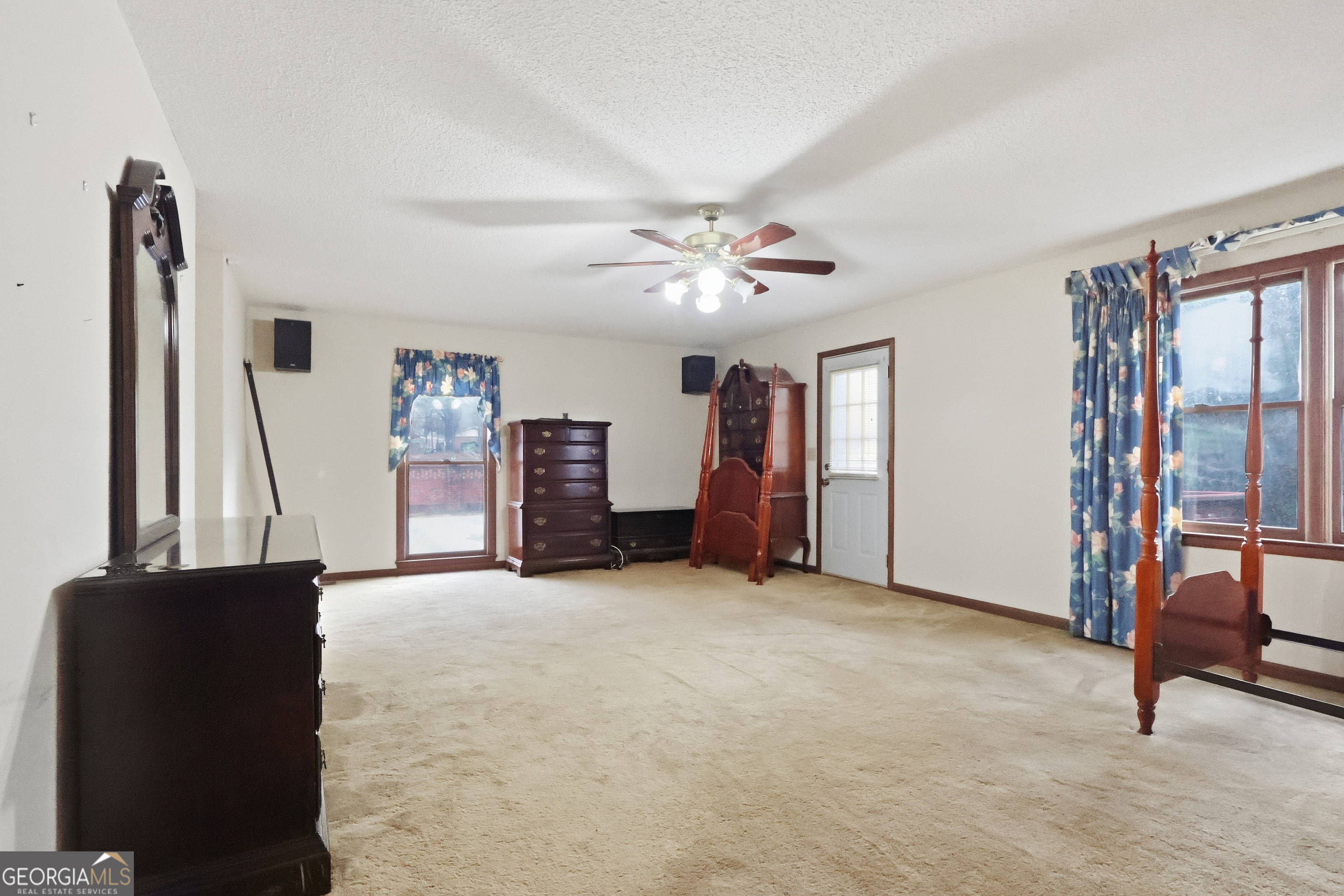 41 Brooks Street Royston, GA 30662 - Photo 24 of 44 a view of a livingroom with furniture and a ceiling fan