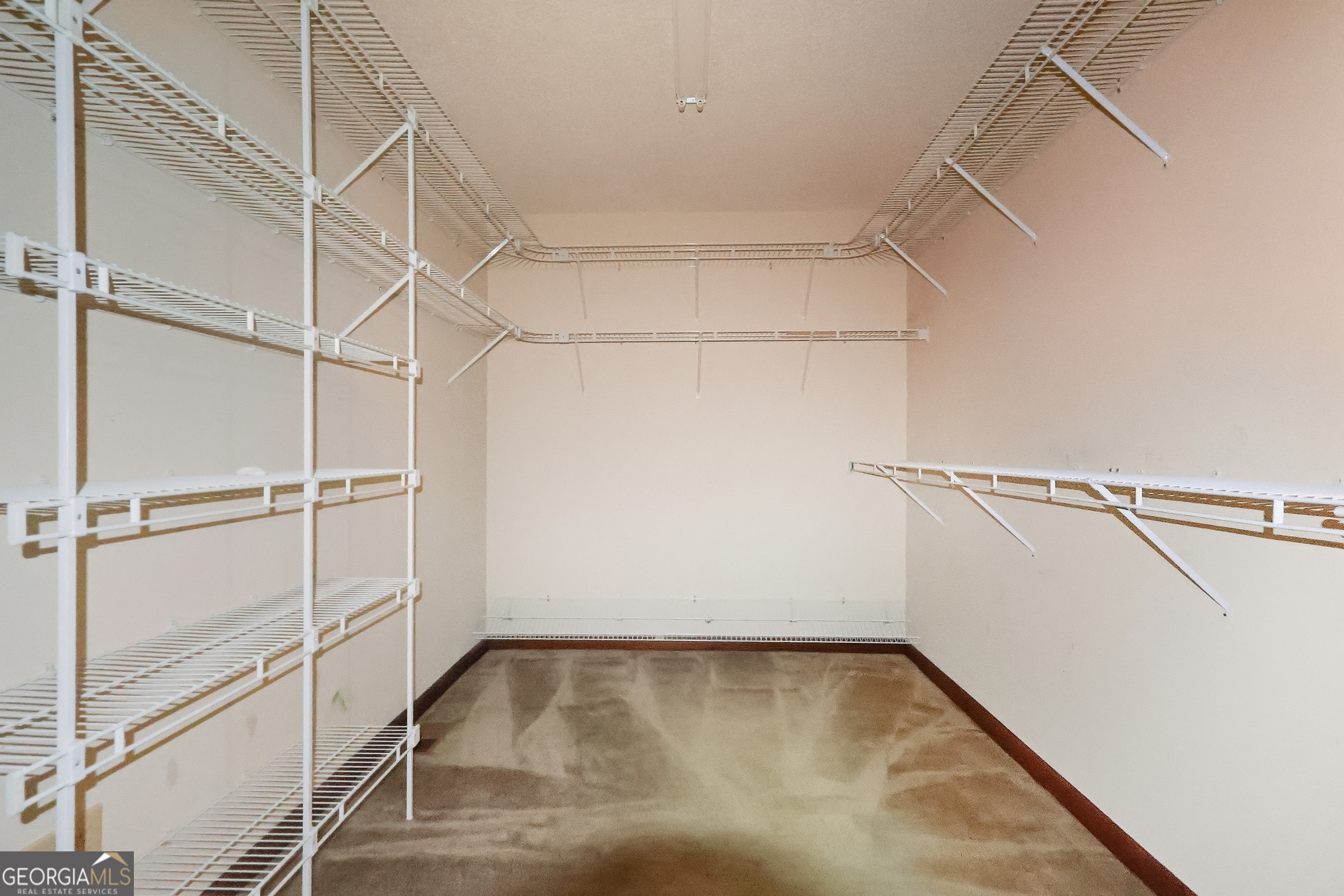 41 Brooks Street Royston, GA 30662 - Photo 27 of 44 a view of a room with racks on the wall