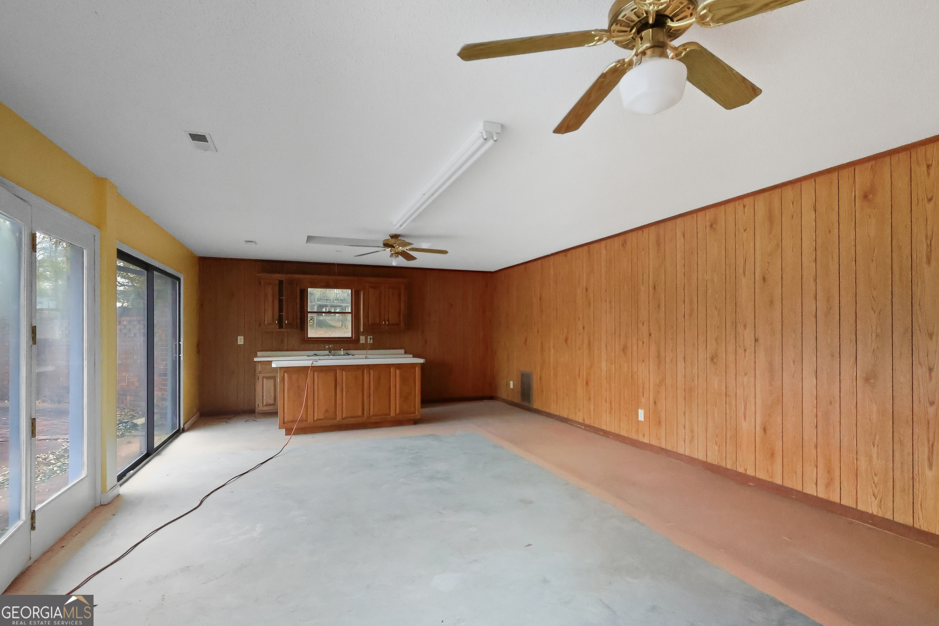 41 Brooks Street Royston, GA 30662 - Photo 42 of 44 a view of a room with a ceiling fan