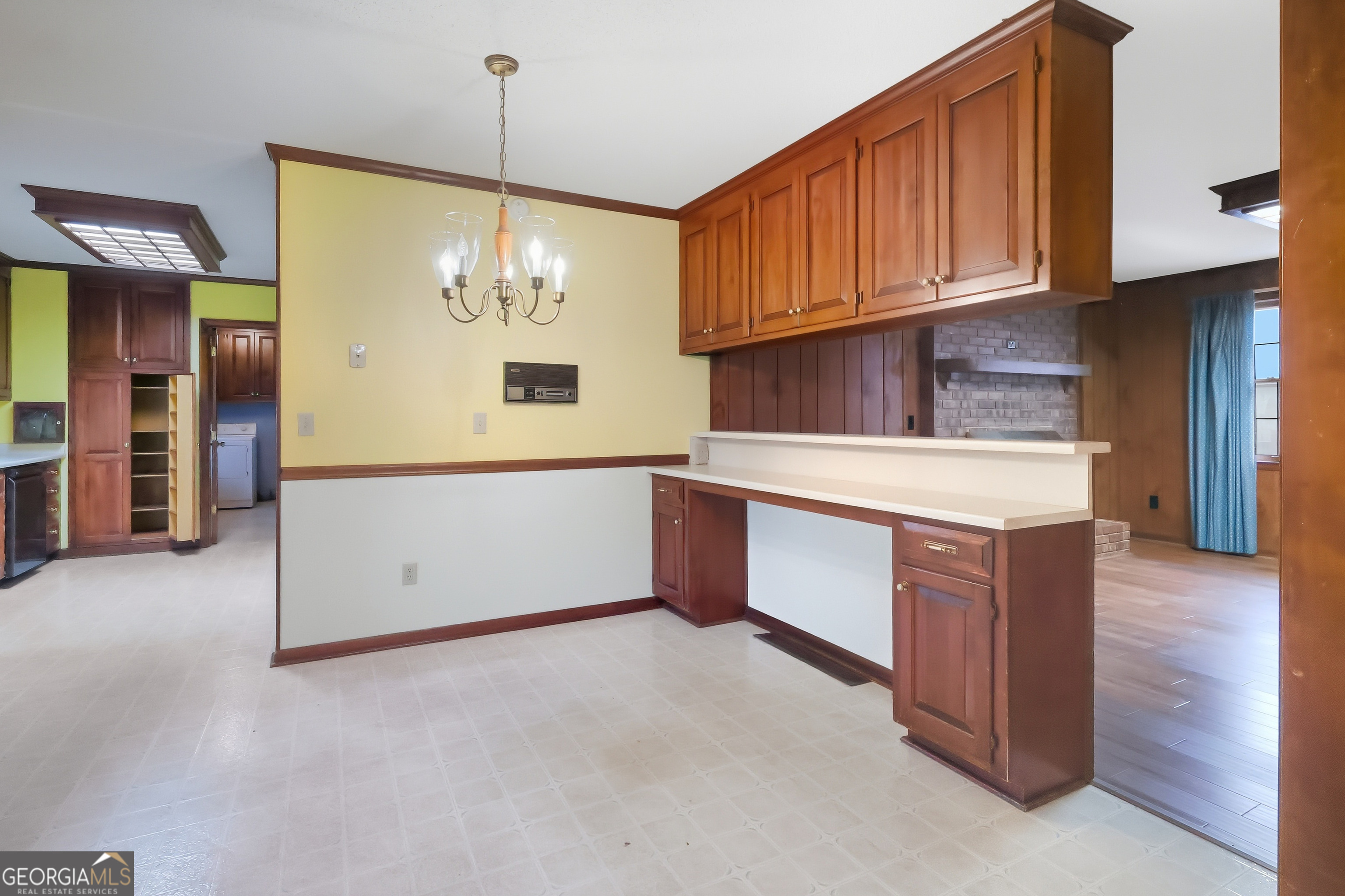 41 Brooks Street Royston, GA 30662 - Photo 9 of 44 a kitchen with stainless steel appliances granite countertop a stove a refrigerator and wooden floors