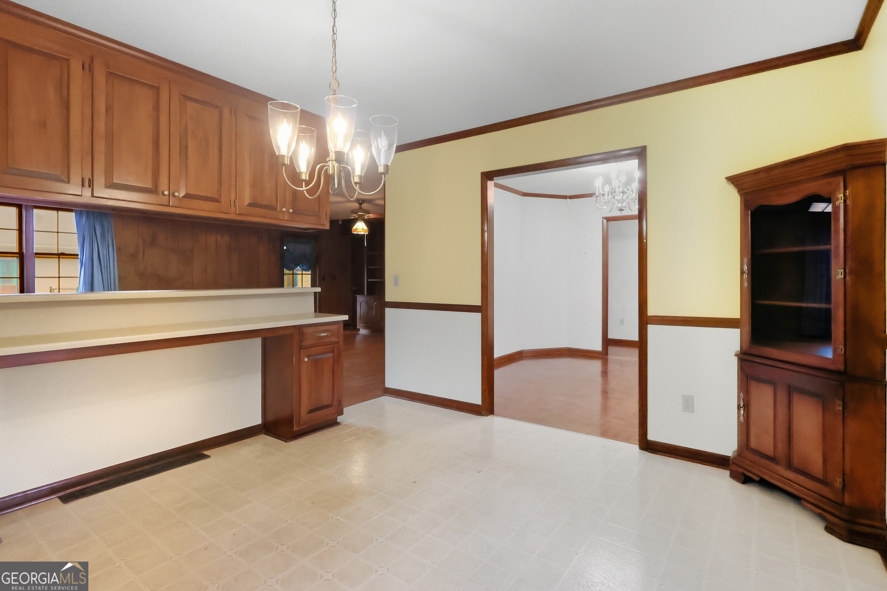 41 Brooks Street Royston, GA 30662 - Photo 10 of 44 a view of a kitchen with a refrigerator and microwave