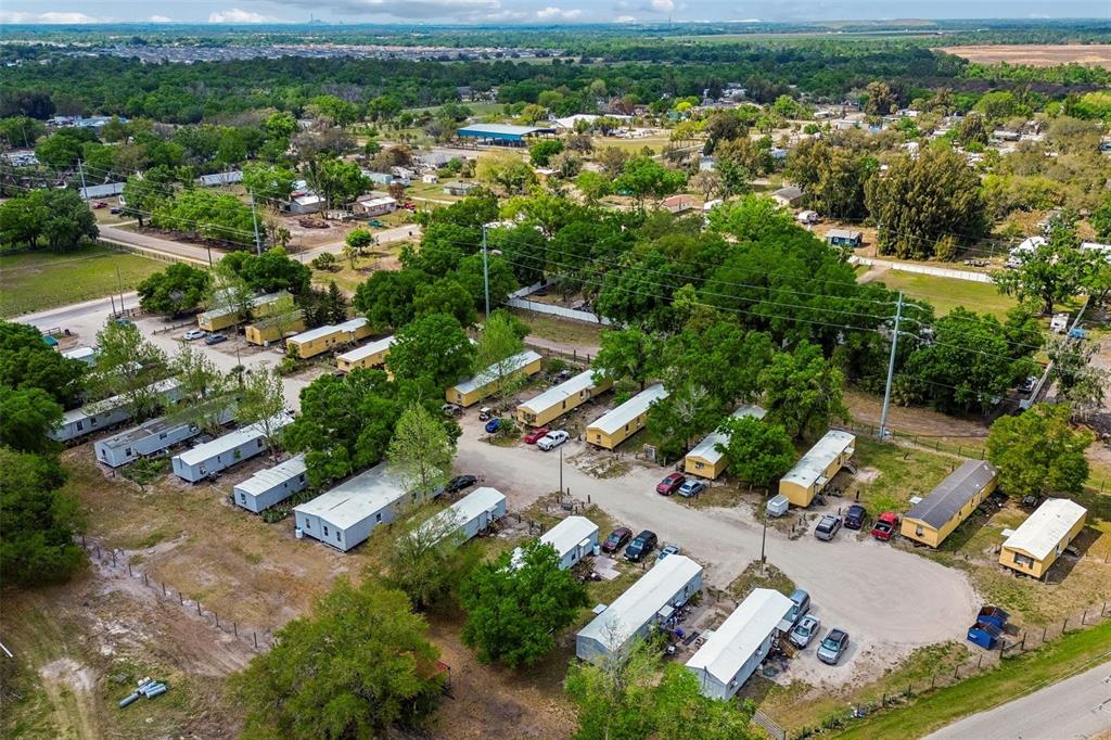 610 Railroad Street Wimauma, FL 33598 - Photo 17 of 34 an aerial view of residential house with outdoor space