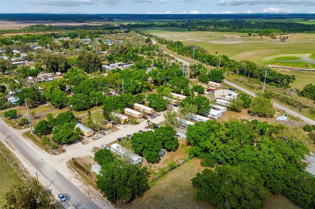610 Railroad Street Wimauma, FL 33598 - Photo 19 of 34 a view of a lake with a city view