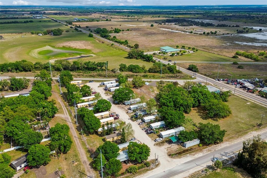 610 Railroad Street Wimauma, FL 33598 - Photo 22 of 34 an aerial view of ocean with residential house and outdoor space