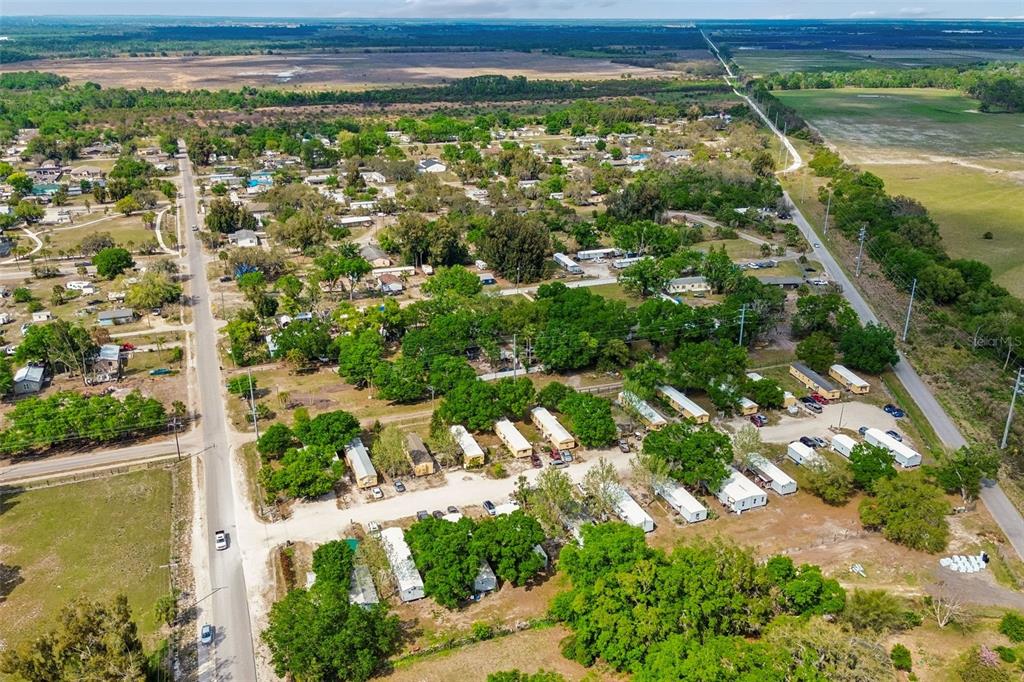 610 Railroad Street Wimauma, FL 33598 - Photo 24 of 34 a view of a lake with a city