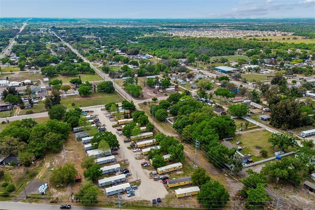 610 Railroad Street Wimauma, FL 33598 - Photo 26 of 34 an aerial view of a city