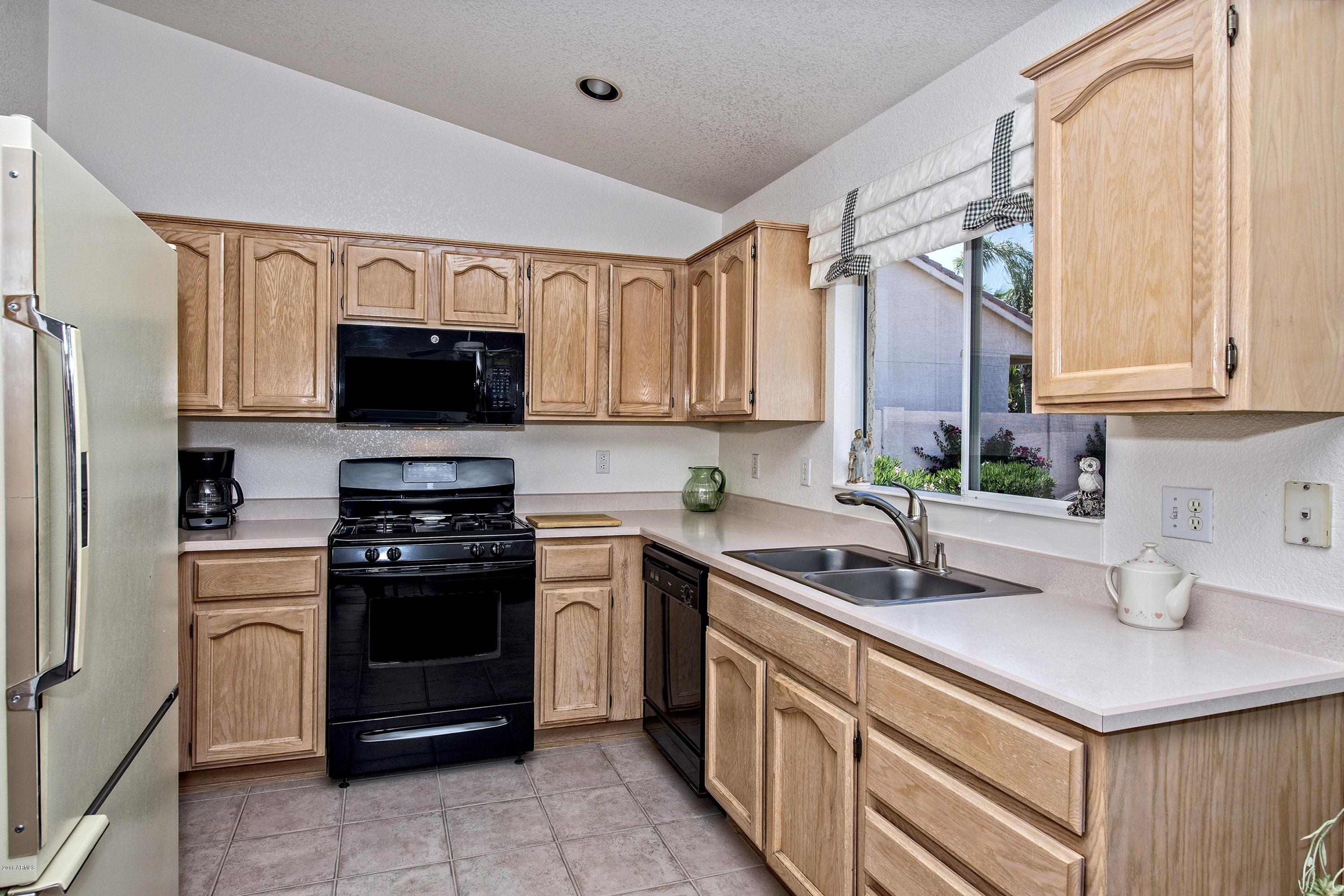 15684 Piccadilly Road Goodyear, AZ 85395 - Photo 7 of 15 007_Kitchen View