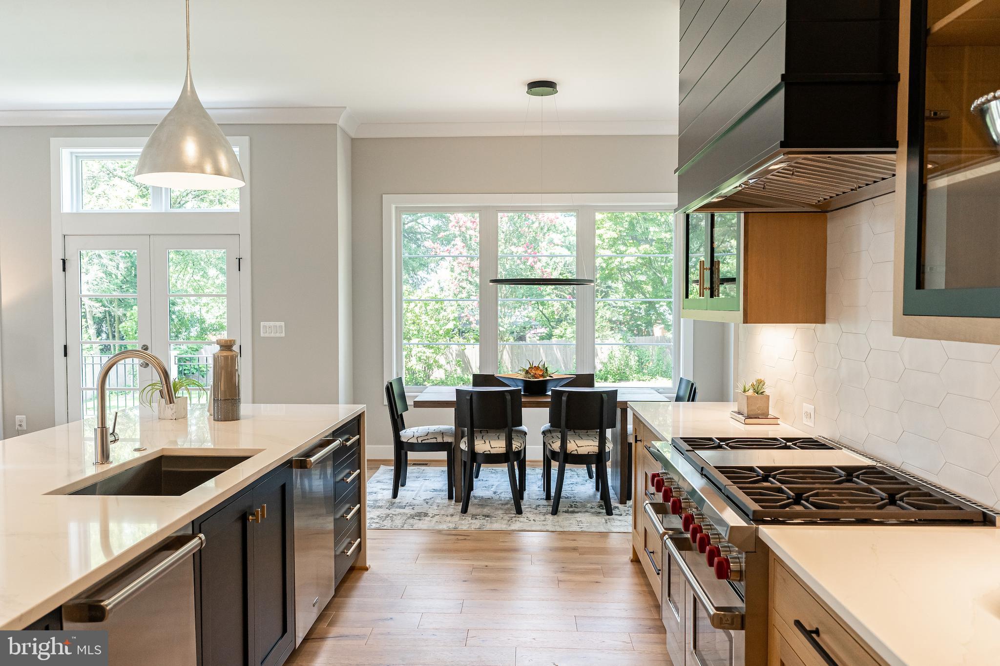 7205 Bayside Court McLean, VA 22101 - Photo 13 of 21 a kitchen with stove and cabinets