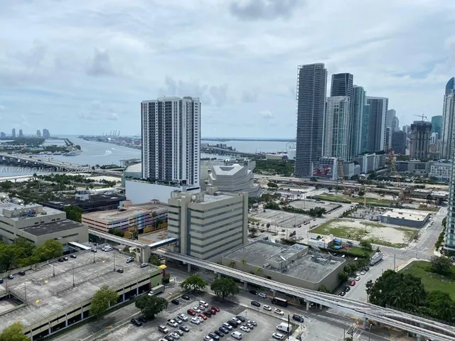 a view of a city with tall buildings