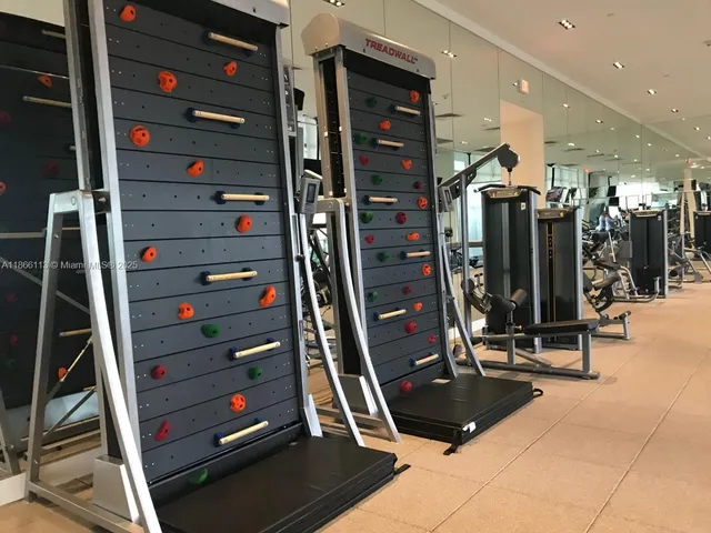 a view of a room with gym equipment