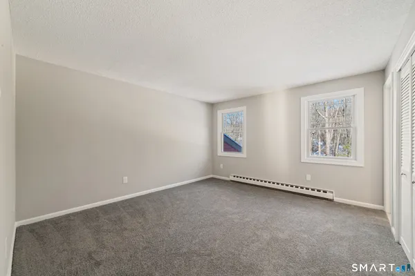 an empty room with windows