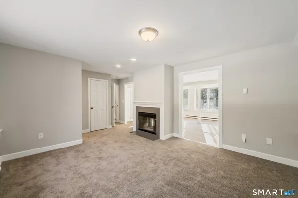 a view of a livingroom with a fireplace
