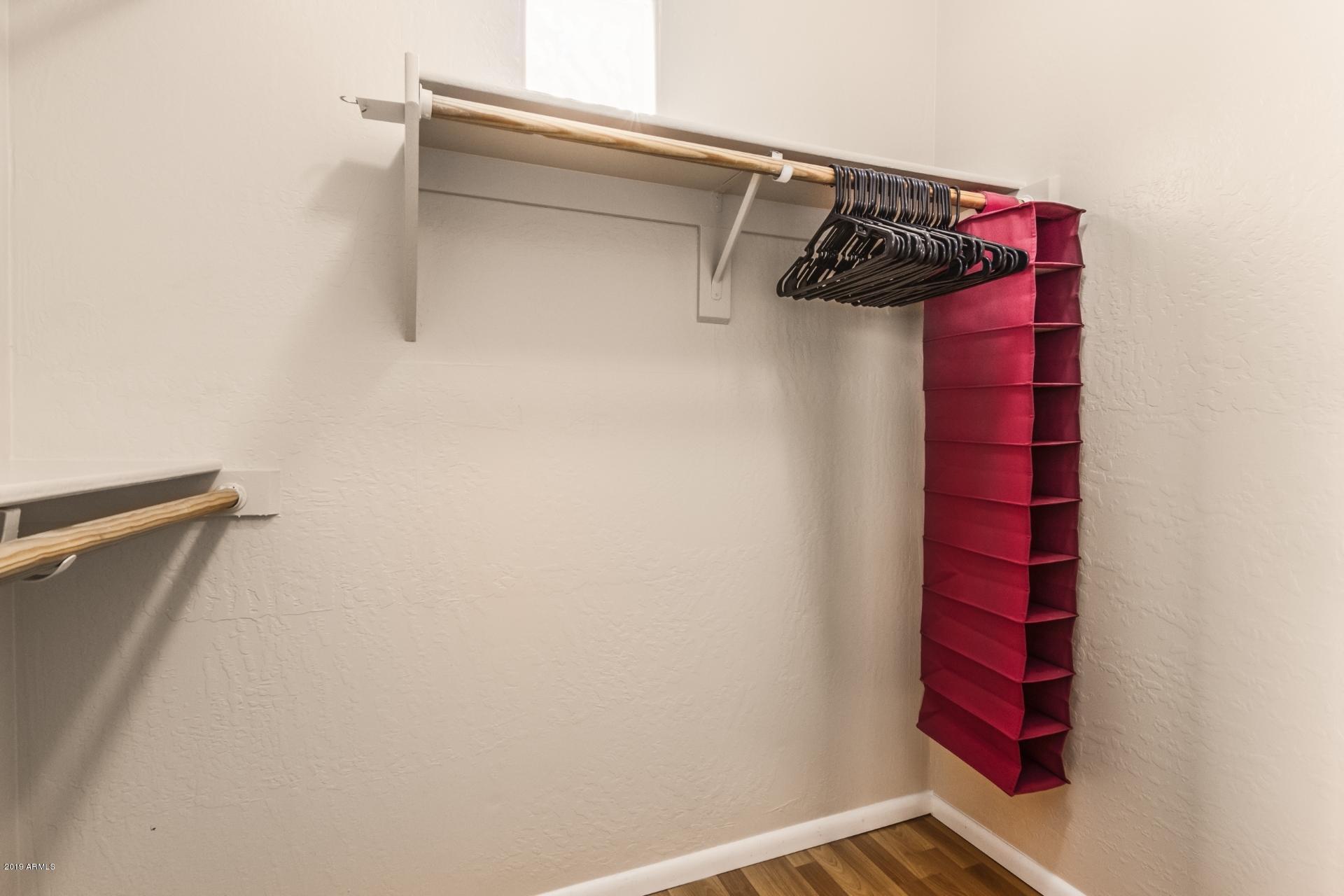 11260 North 92nd Street, Unit 1127 Scottsdale, AZ 85260 - Photo 21 of 42 a view of walk in closet