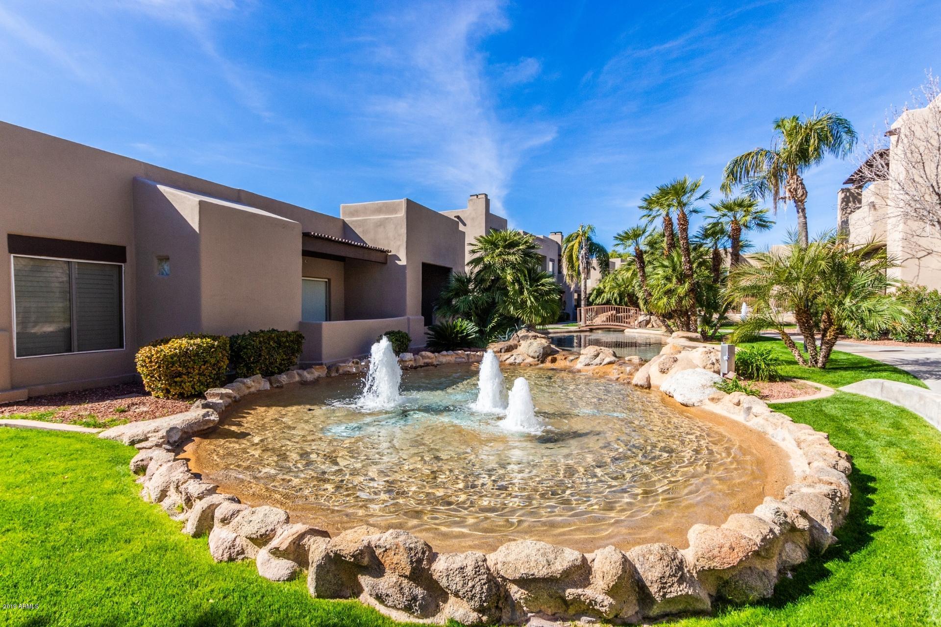 11260 North 92nd Street, Unit 1127 Scottsdale, AZ 85260 - Photo 33 of 42 a view of a swimming pool with a patio
