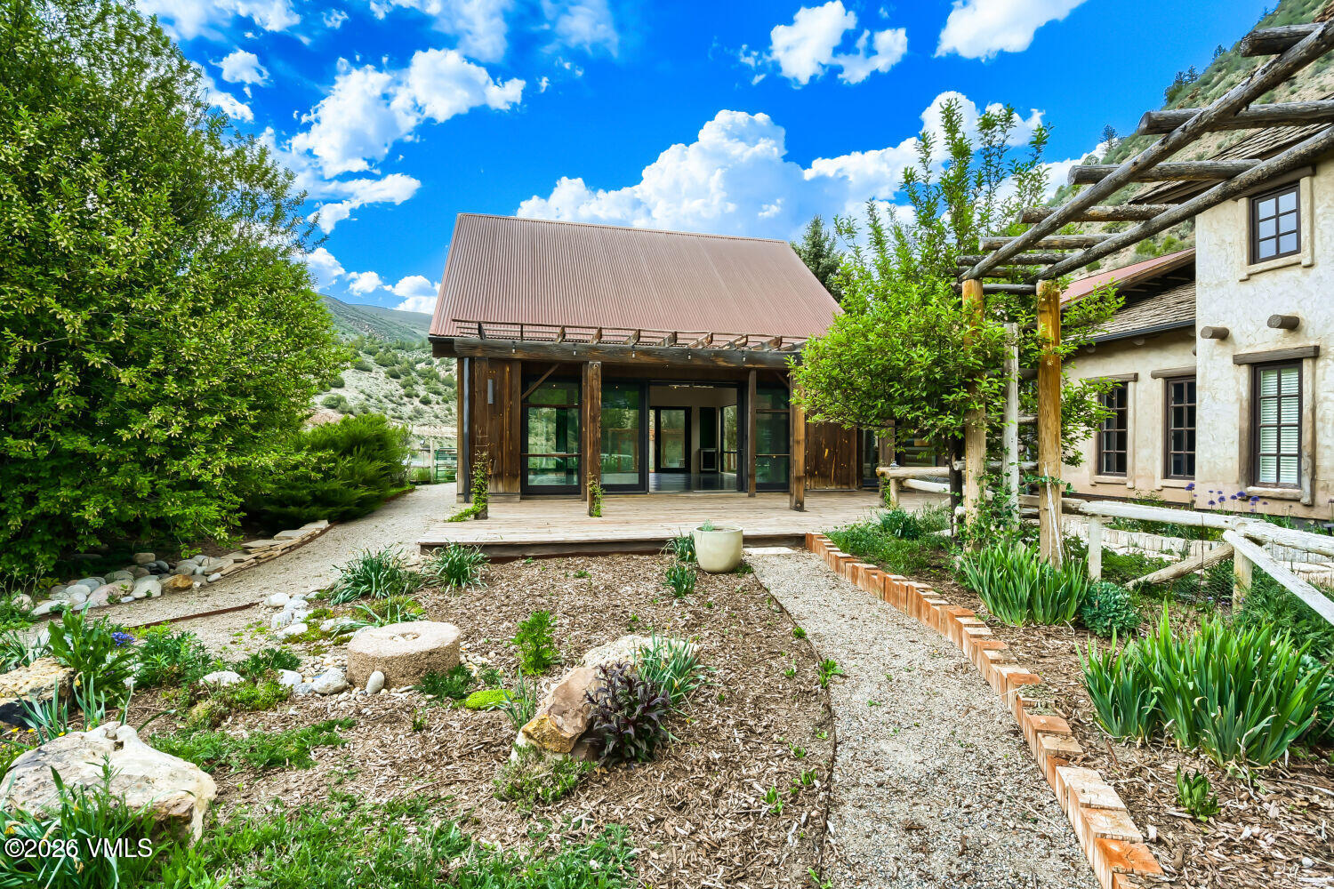 1644 Squaw Creek Road Edwards, CO 81632 - Photo 17 of 21 a front view of a house with a yard
