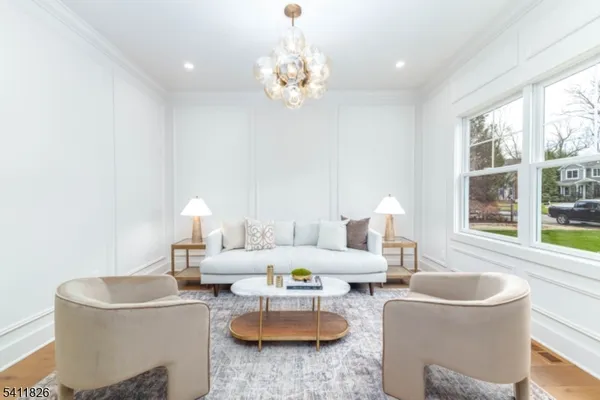 a bathroom with a double vanity sink a toilet and a bathtub