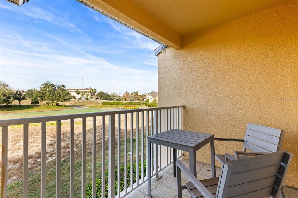 856 Assembly Court Reunion, FL 34747 - Photo 18 of 37 a view of a balcony with chairs