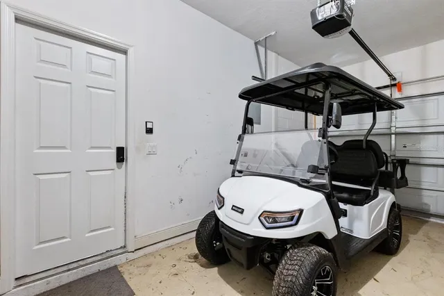 an aerial view of residential houses with city view