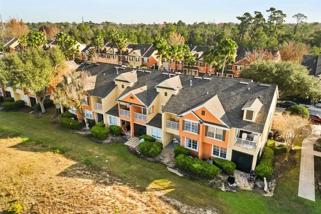 an aerial view of a golf course with swimming pool