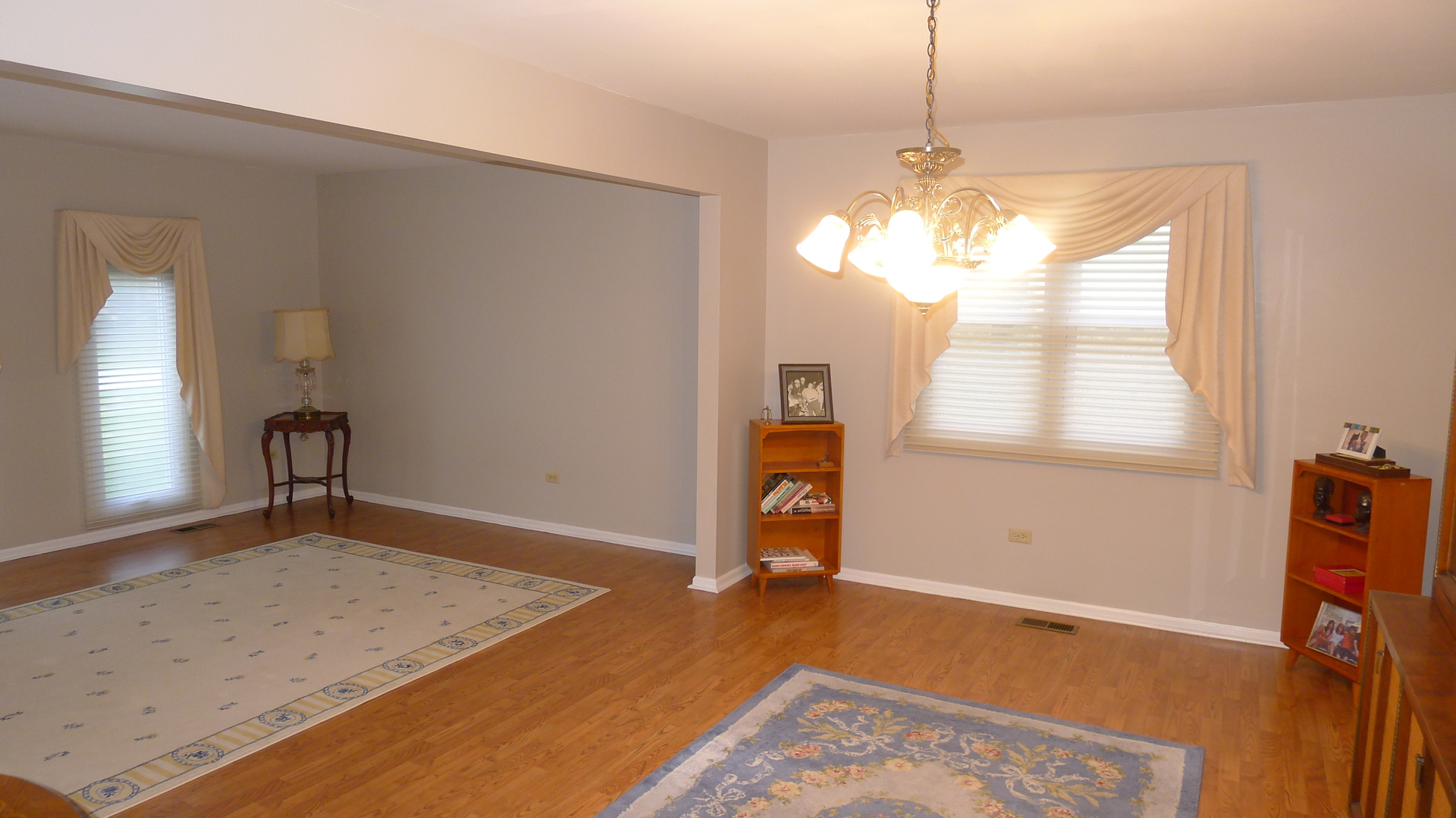 1417 Lawrence Crescent Flossmoor, IL 60422 - Photo 7 of 24 a view of a room with wooden floor and a window