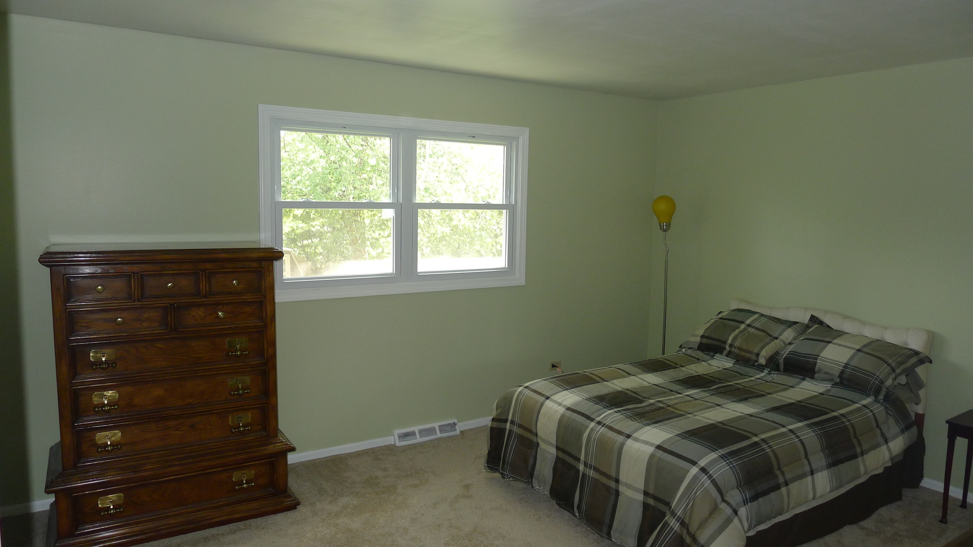 1417 Lawrence Crescent Flossmoor, IL 60422 - Photo 9 of 24 a bedroom with a bed and a window
