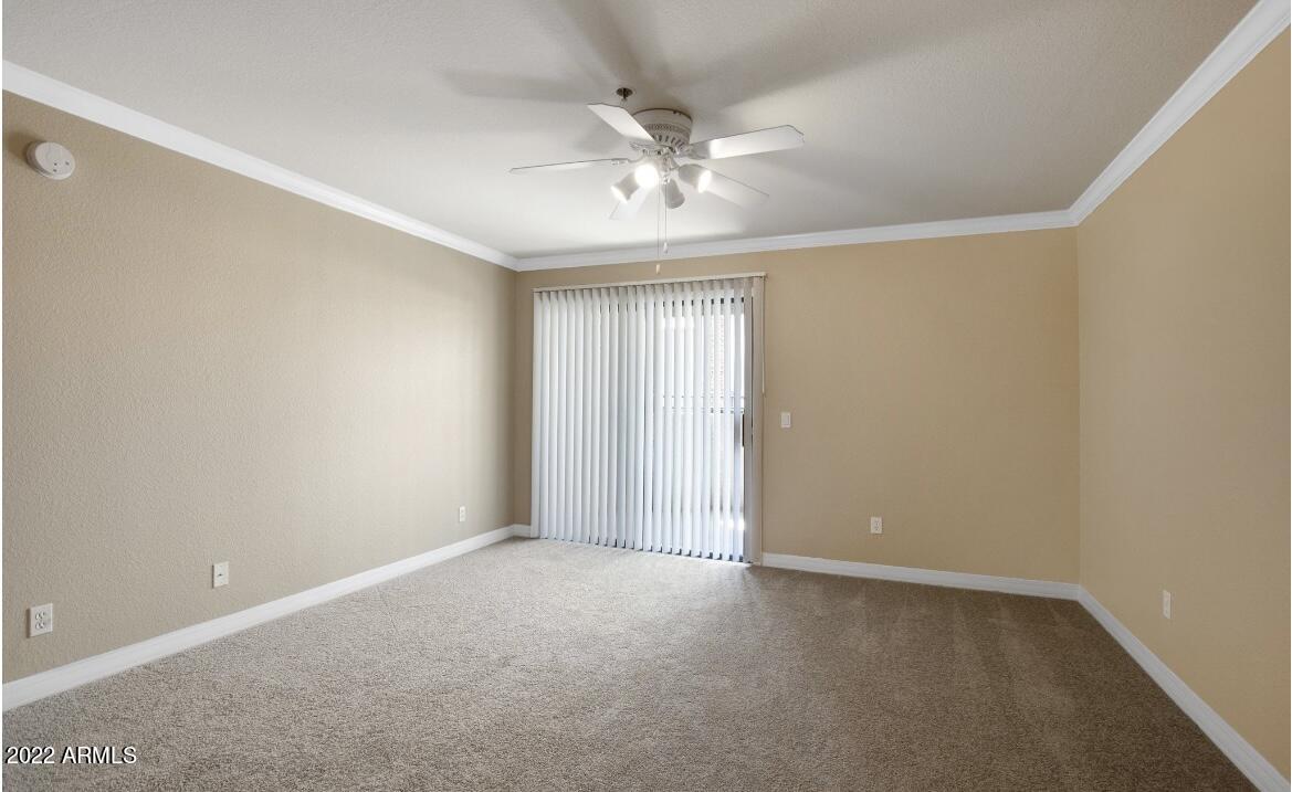 2025 East Campbell Avenue, Unit 158 Phoenix, AZ 85016 - Photo 12 of 23 a view of an empty room with a window