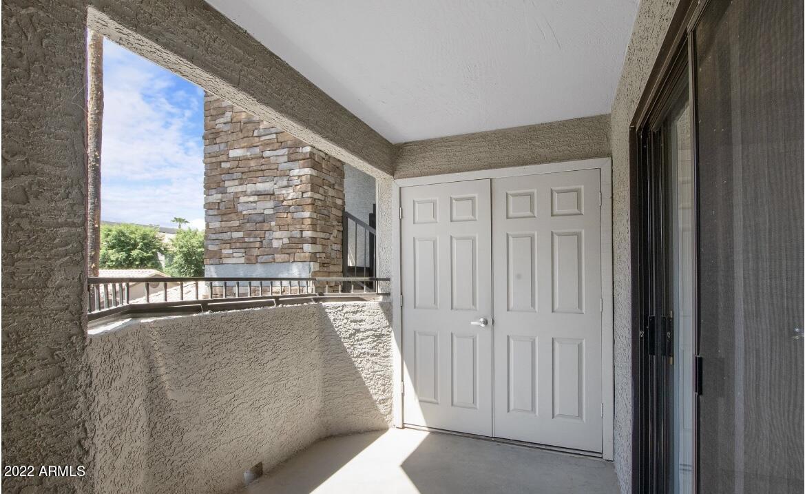 2025 East Campbell Avenue, Unit 158 Phoenix, AZ 85016 - Photo 14 of 23 a view of a living room area with windows