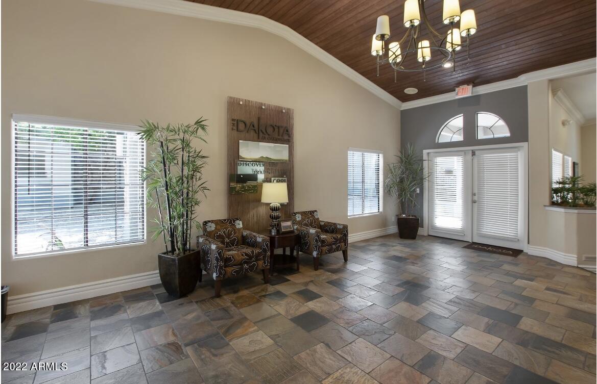2025 East Campbell Avenue, Unit 158 Phoenix, AZ 85016 - Photo 15 of 23 a living room with furniture and a large window