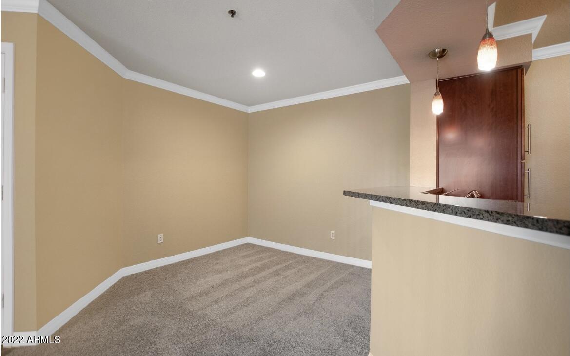 2025 East Campbell Avenue, Unit 158 Phoenix, AZ 85016 - Photo 8 of 23 a view of a room with wooden floor