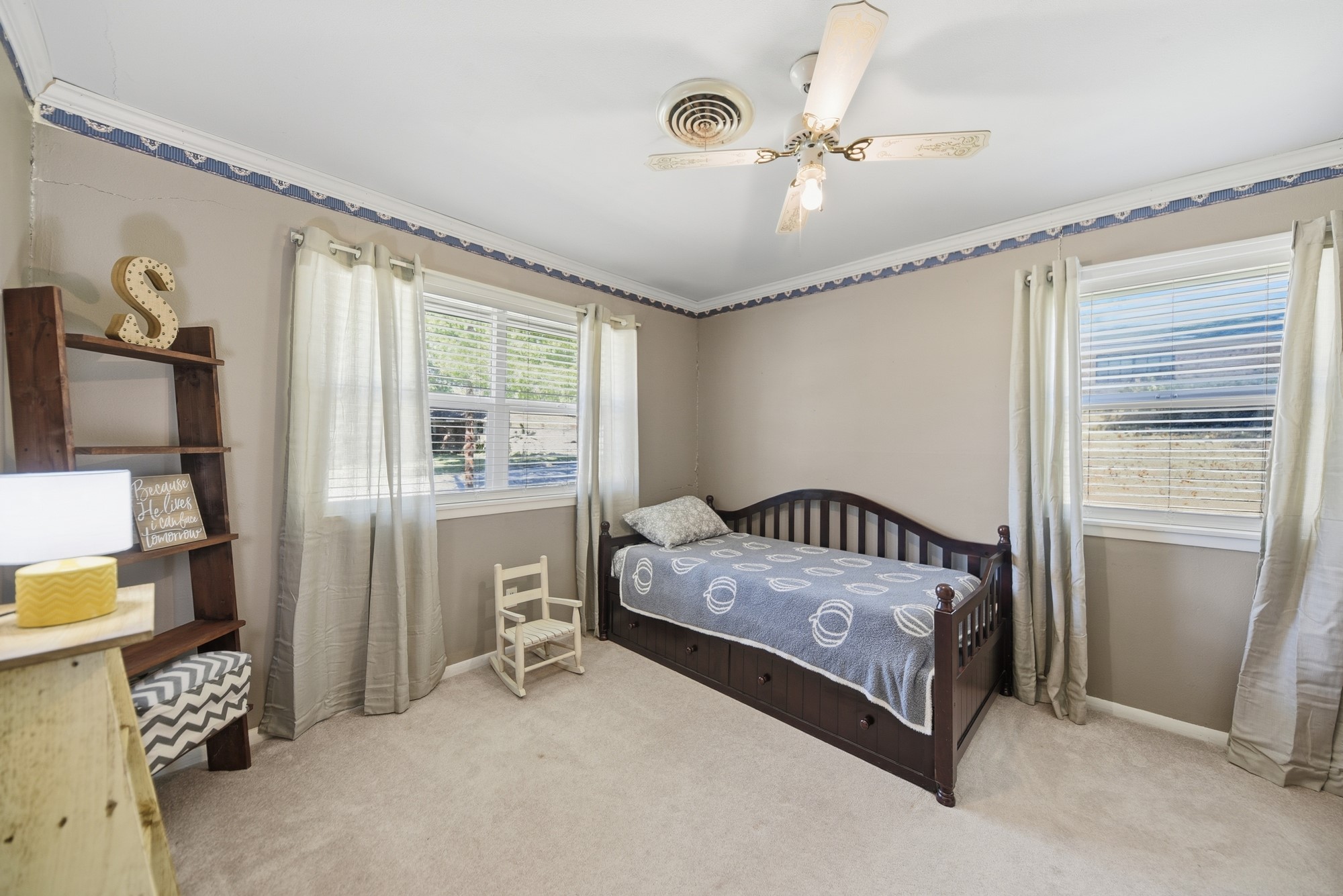 1705 Eldon Street Brenham, TX 77833 - Photo 20 of 30 a bedroom with a bed and a window