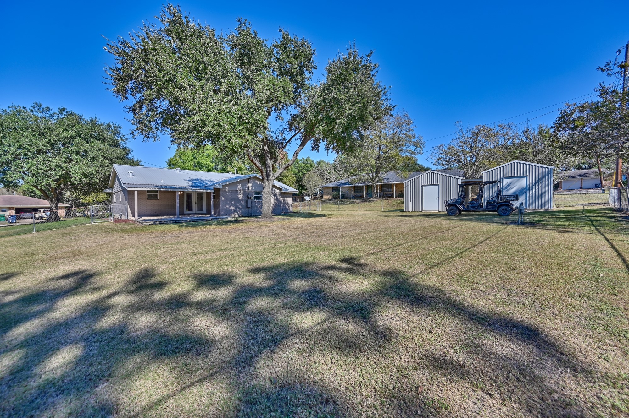 1705 Eldon Street Brenham, TX 77833 - Photo 30 of 30 a view of a house with a yard and tree s