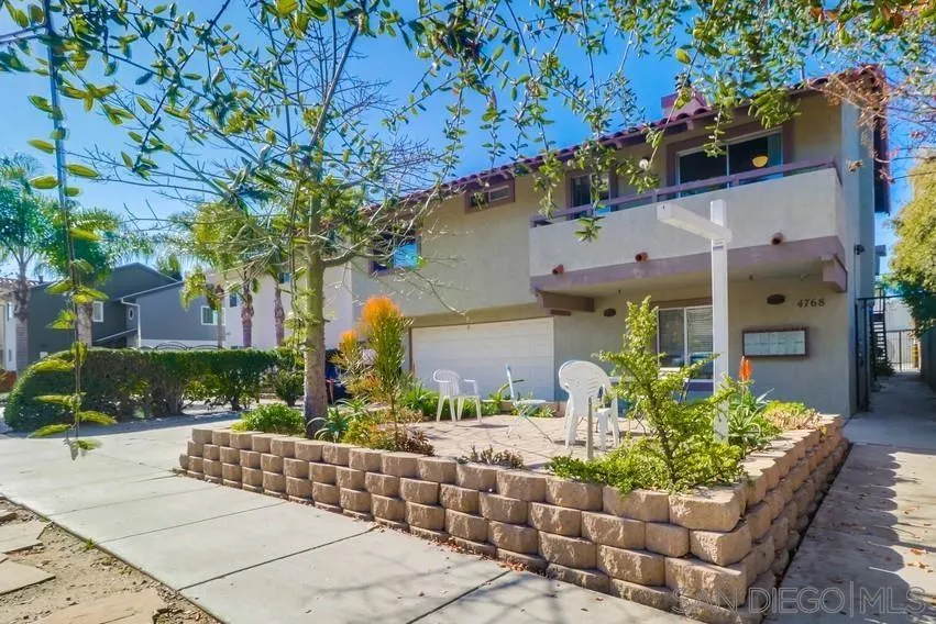 4768 35th Street, Unit 4 San Diego, CA 92116 - Photo 1 of 27 a view of a chairs and table in the patio