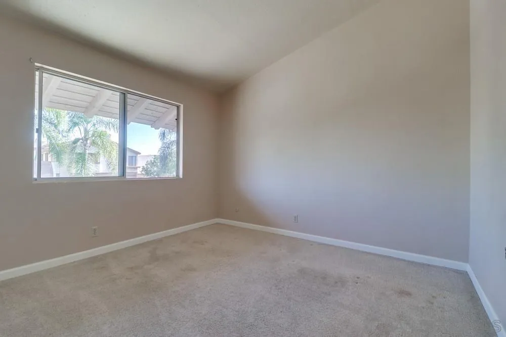 4768 35th Street, Unit 4 San Diego, CA 92116 - Photo 18 of 27 an empty room with windows