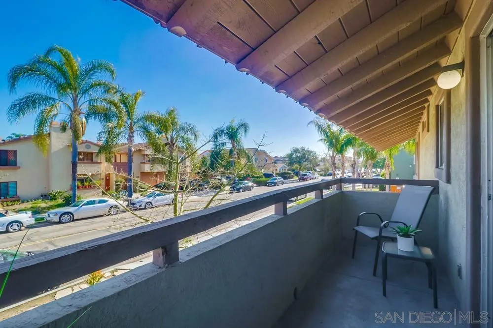 4768 35th Street, Unit 4 San Diego, CA 92116 - Photo 22 of 27 a roof deck with table and chairs and potted plants