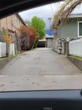 a view of a street with cars