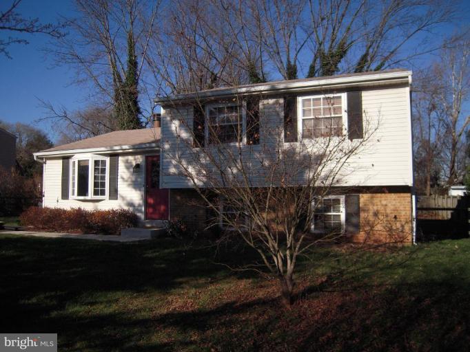 17317 Soper Street Poolesville, MD 20837 - Photo 1 of 29 a front view of a house with a yard
