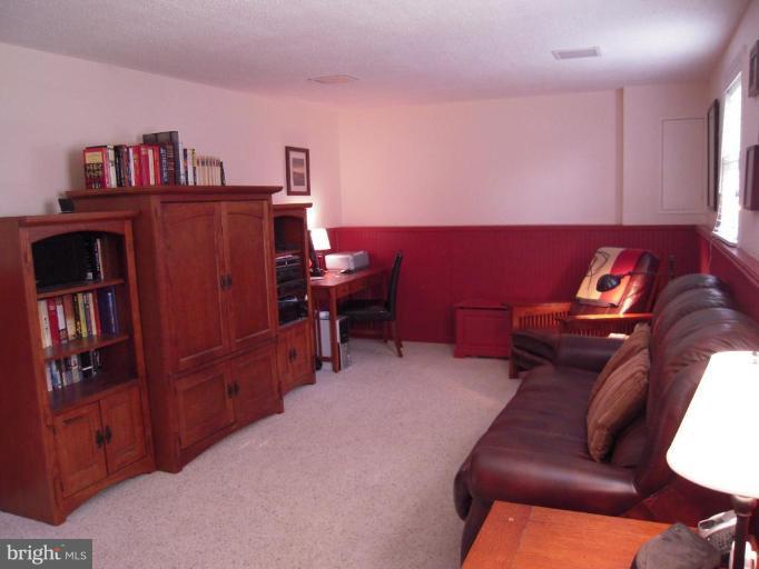 17317 Soper Street Poolesville, MD 20837 - Photo 11 of 29 a living room with furniture
