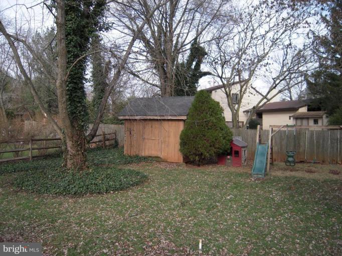 17317 Soper Street Poolesville, MD 20837 - Photo 23 of 29 a view of a trees and barn in the back yard
