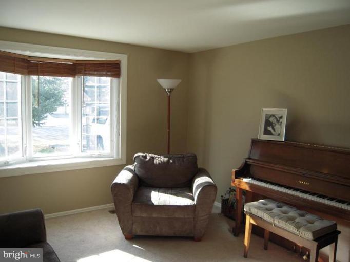 17317 Soper Street Poolesville, MD 20837 - Photo 25 of 29 a living room with furniture and a window