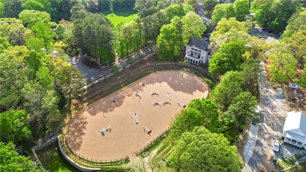 4555 Runnemede Road Northwest Atlanta, GA 30327 - Photo 41 of 51 an aerial view of a house with lots of trees