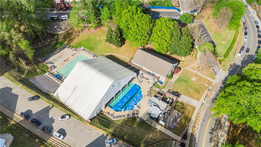 4555 Runnemede Road Northwest Atlanta, GA 30327 - Photo 44 of 51 an aerial view of a house with a yard and potted plants
